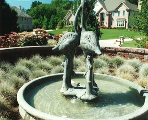 spitting birds water feature