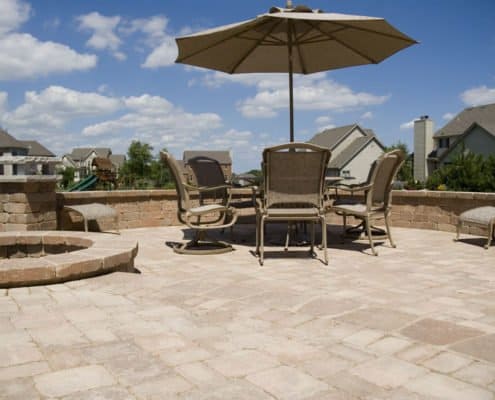 patio with firepit and pillar